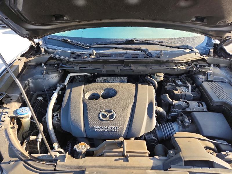 Photo 12 from auction – 2014 MAZDA CX-5 SPORT with VIN JM3KE2BE4E0422625