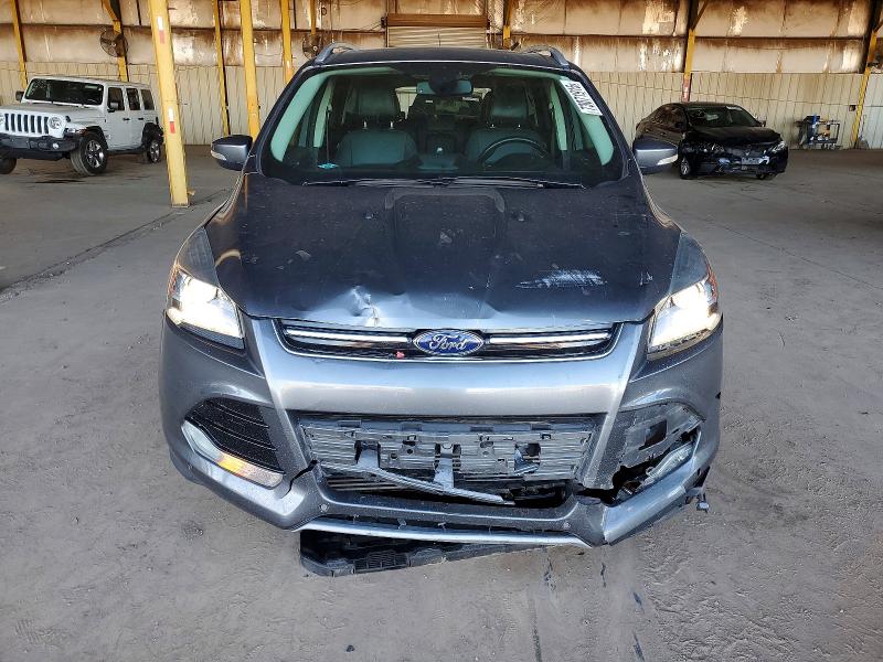Photo 5 from auction – 2014 FORD ESCAPE TIT with VIN 1FMCU0J95EUB09015