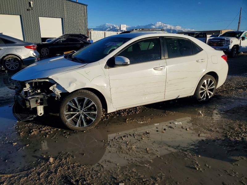 TOYOTA COROLLA L 2017 with VIN 5YFBURHE1HP677190 - Photo from auction