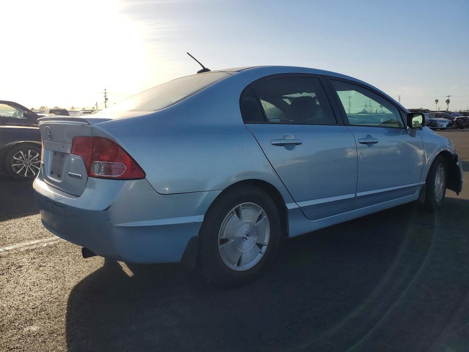 Photo 3 from auction – 2007 HONDA CIVIC HYB with VIN JHMFA36247S003451