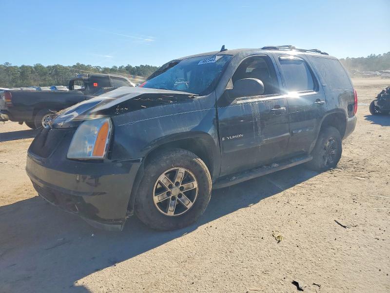 GMC YUKON 2007 with VIN 1GKFK130X7R252595 - Photo from auction