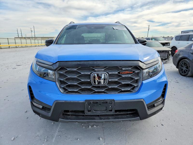 Photo 5 from auction – 2024 HONDA PASSPORT with VIN 5FNYF8H60RB013712