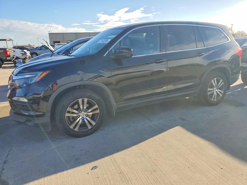 HONDA PILOT EXL 2017 with VIN 5FNYF5H52HB012727 - Photo from auction