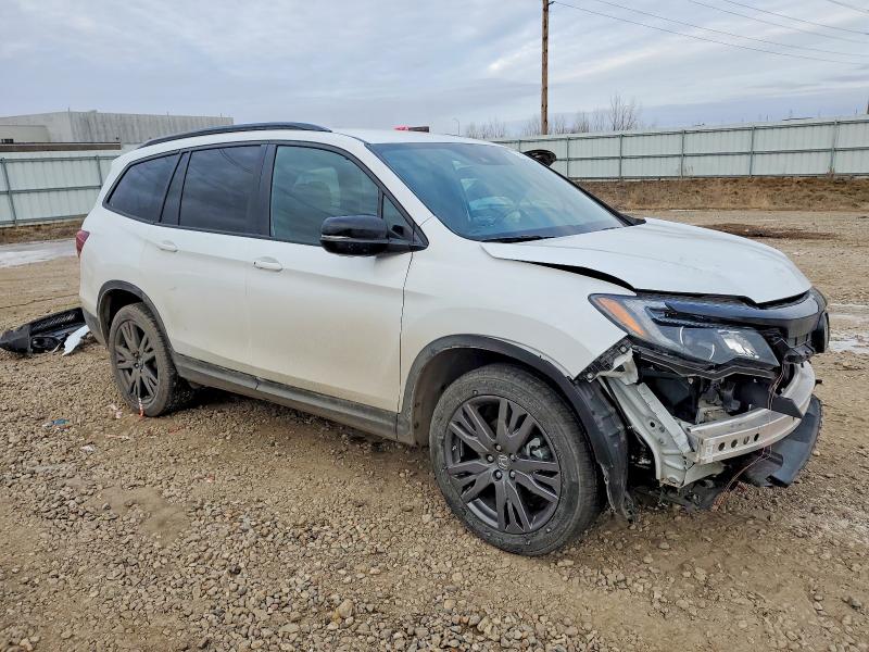 Photo 4 from auction – 2022 HONDA PILOT SPOR with VIN 5FNYF6H35NB082545