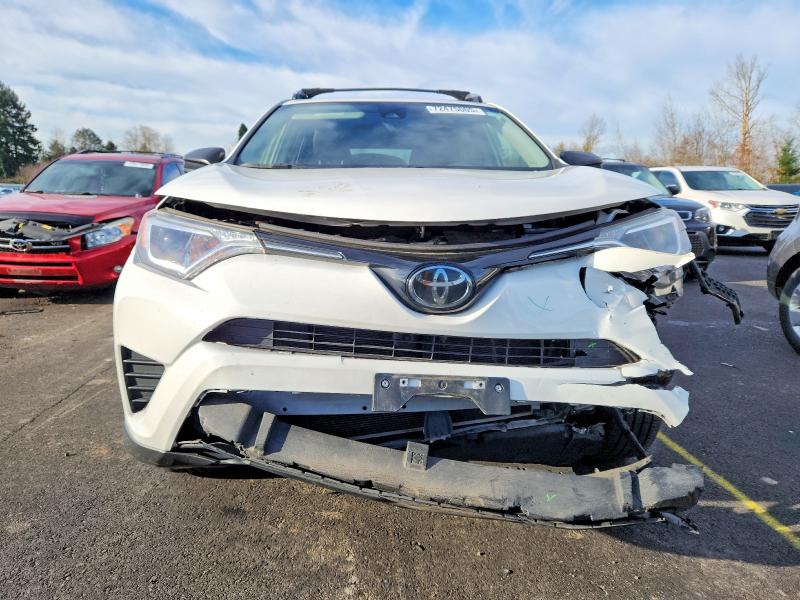 Photo 5 from auction – 2018 TOYOTA RAV4 LE with VIN JTMBFREV6JJ747985