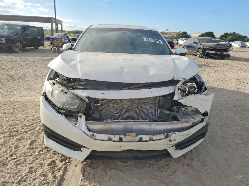 Photo 5 from auction – 2018 HONDA CIVIC EX with VIN 19XFC2F74JE036011