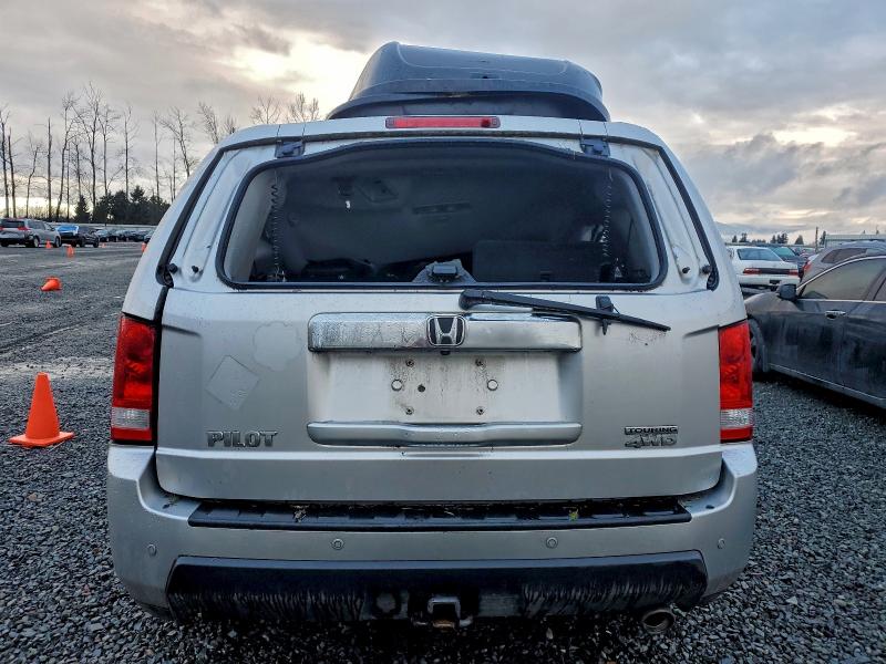 Photo 6 from auction – 2011 HONDA PILOT TOUR with VIN 5FNYF4H90BB056066