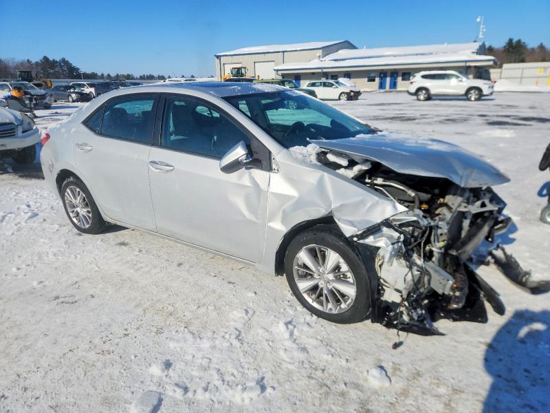 Photo 4 from auction – 2014 TOYOTA COROLLA with VIN 2T1BURHE4EC035204
