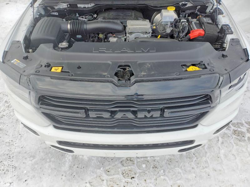 Photo 11 from auction – 2023 RAM 1500 with VIN 1C6SRFVTXPN690641