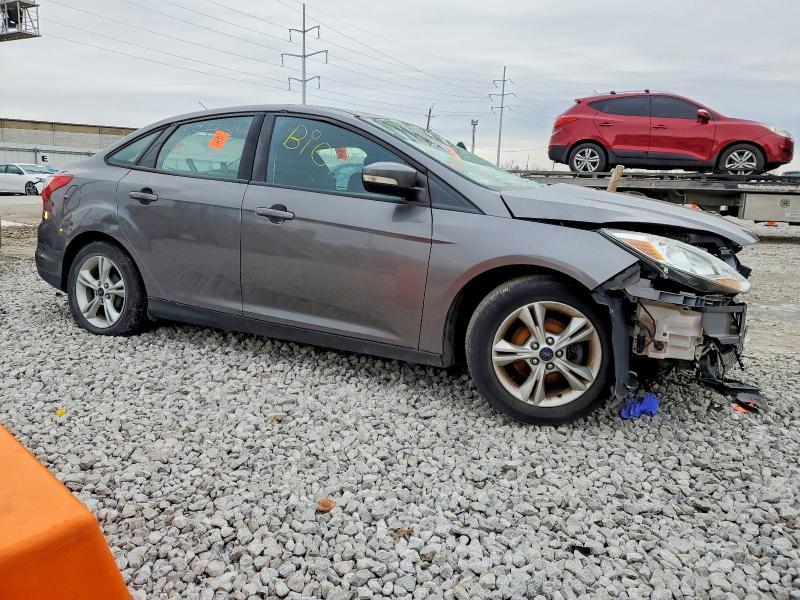 Photo 4 from auction – 2014 FORD FOCUS with VIN 1FADP3F25EL438757