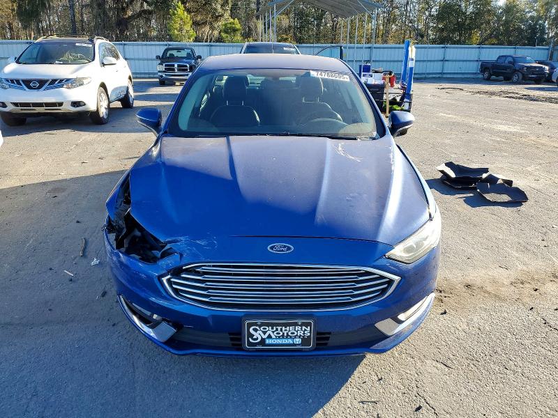 Photo 5 from auction – 2018 FORD FUSION with VIN 3FA6P0LU7JR264201