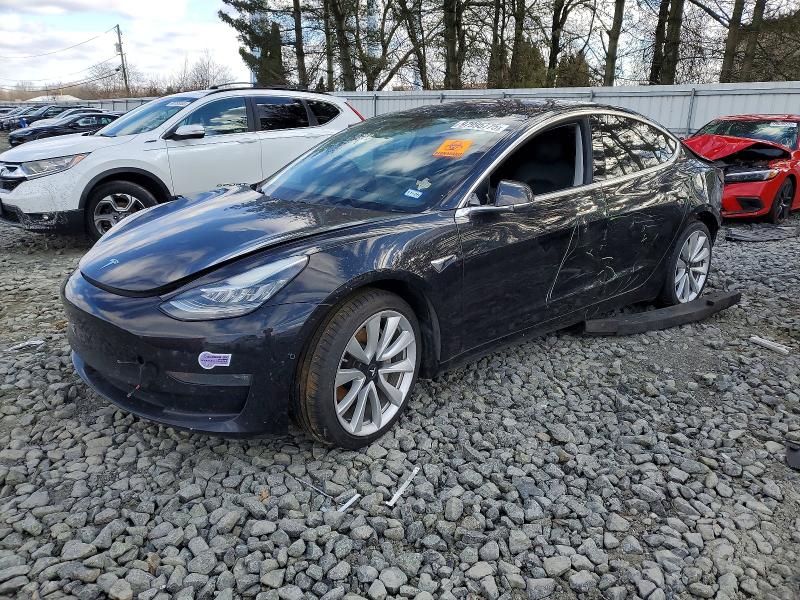 TESLA MODEL 3 2018 with VIN 5YJ3E1EA8JF071231 - Photo from auction