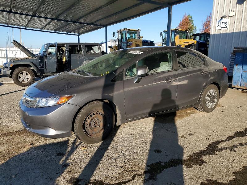HONDA CIVIC LX 2012 with VIN 2HGFB2F52CH303396 - Photo from auction