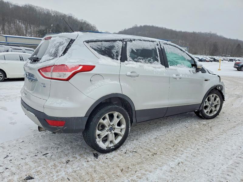 Photo 3 from auction – 2013 FORD ESCAPE with VIN 1FMCU9H99DUA17382