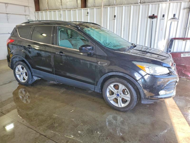 Photo 4 from auction – 2014 FORD ESCAPE SE with VIN 1FMCU0GX5EUB24880