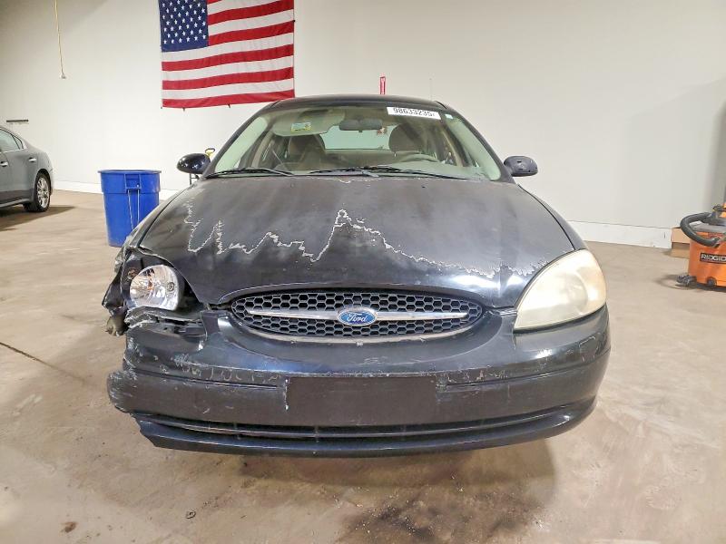 Photo 5 from auction – 2003 FORD TAURUS SE with VIN 1FAFP53U93G229053