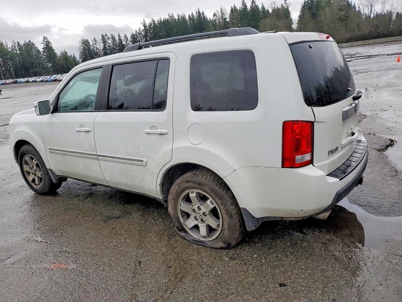 Photo 2 from auction – 2011 HONDA PILOT TOUR with VIN 5FNYF4H96BB084180