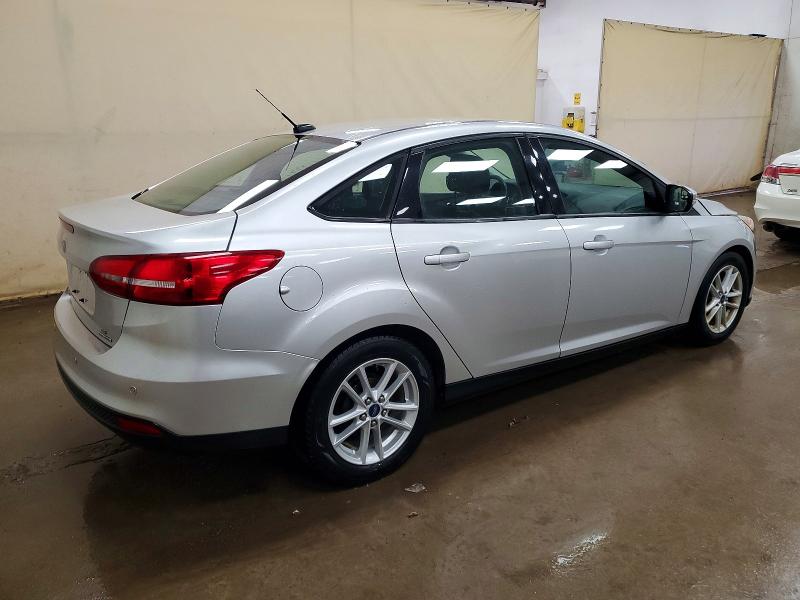 Photo 3 from auction – 2016 FORD FOCUS with VIN 1FADP3F21GL267377