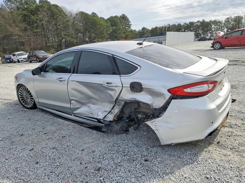 Photo 2 from auction – 2016 FORD FUSION TIT with VIN 3FA6P0K97GR344569