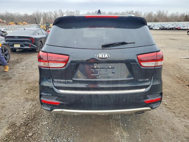 Photo 6 from auction – 2016 KIA SORENTO SX with VIN 5XYPKDA56GG004133