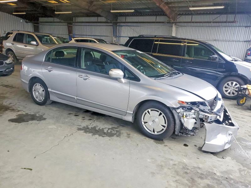 Photo 4 from auction – 2011 HONDA CIVIC HYBR with VIN JHMFA3F28BS000819