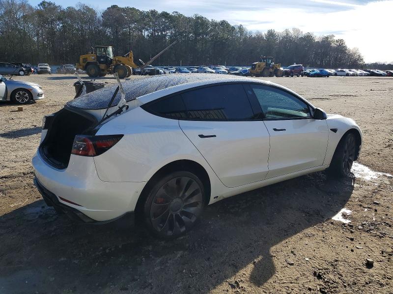 Photo 3 from auction – 2021 TESLA MODEL 3 with VIN 5YJ3E1EC8MF973366
