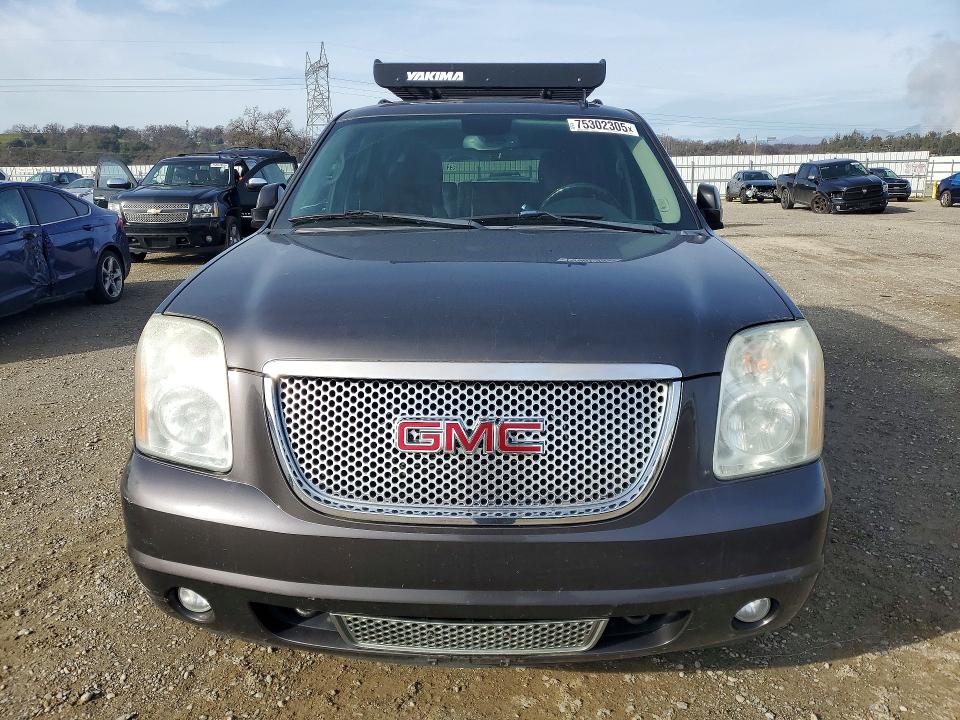 Photo 5 from auction – 2011 GMC YUKON with VIN 1GKS2GEJ9BR224528