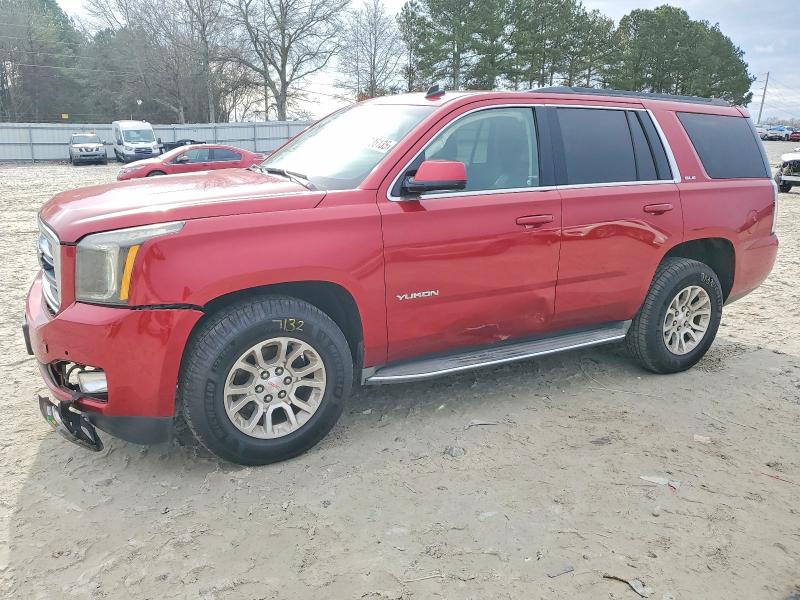 GMC YUKON SLE 2015 with VIN 1GKS1AKC5FR119321 - Photo from auction