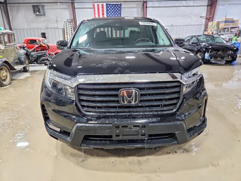 Photo 5 from auction – 2022 HONDA RIDGELINE with VIN 5FPYK3F53NB028148