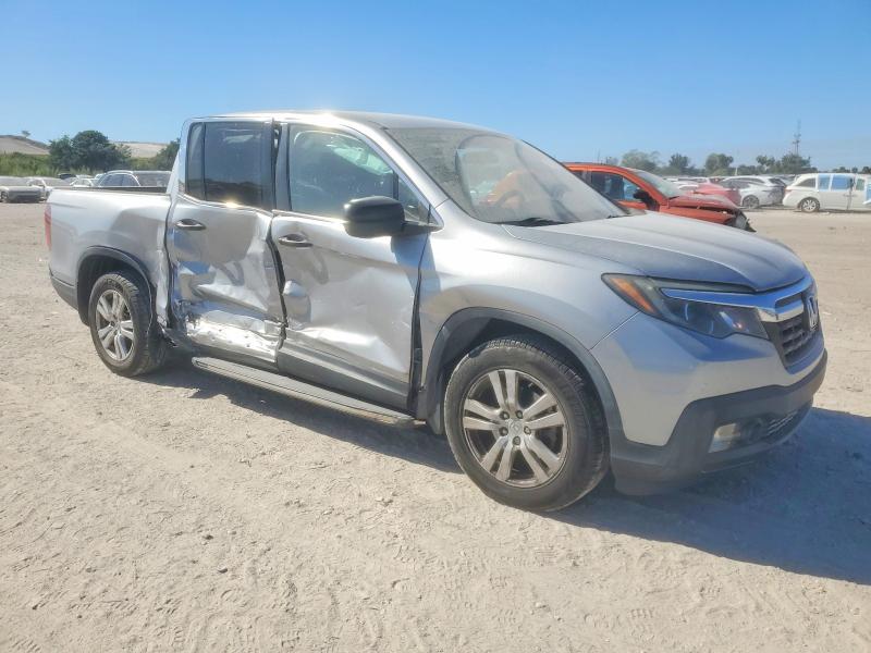 Photo 4 from auction – 2019 HONDA RIDGELINE with VIN 5FPYK2F24KB005764