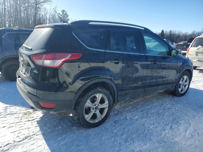 Photo 3 from auction – 2016 FORD ESCAPE with VIN 1FMCU9GX0GUB41416