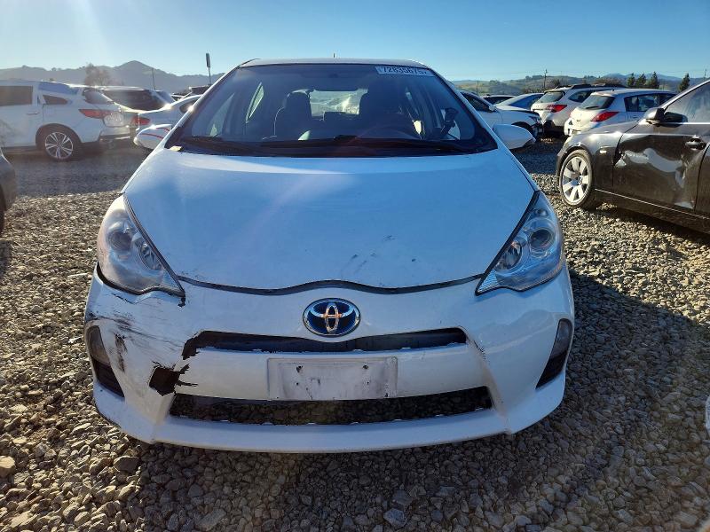 Photo 5 from auction – 2013 TOYOTA PRIUS C with VIN JTDKDTB39D1542932