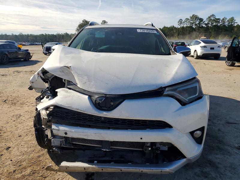 Photo 5 from auction – 2016 TOYOTA RAV4 with VIN JTMNFREV6GD084017