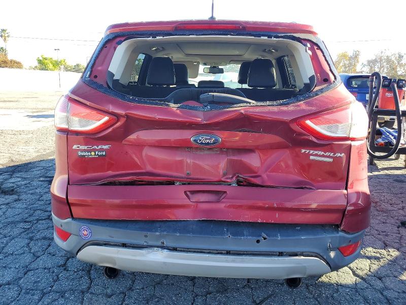 Foto 6 de la subasta – 2013 FORD ESCAPE TIT con VIN 1FMCU9J96DUB95860