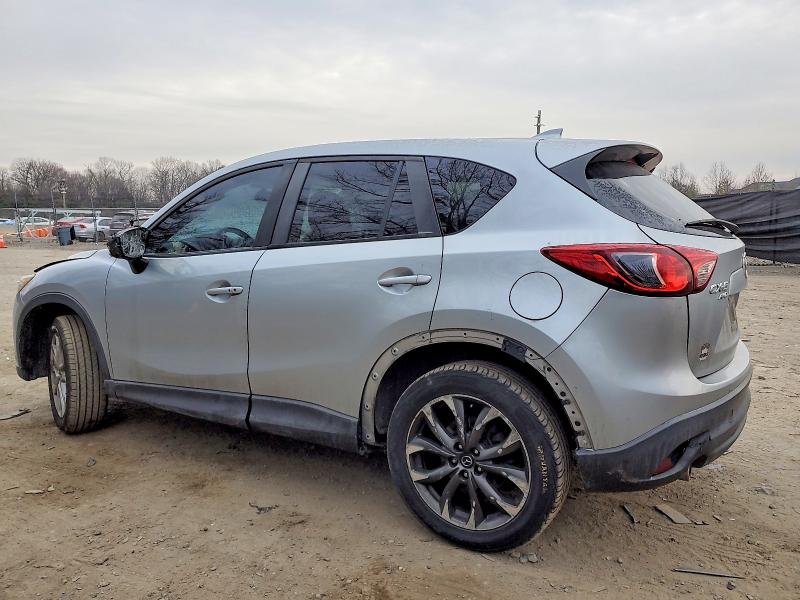 Photo 2 from auction – 2016 MAZDA CX-5 GT with VIN JM3KE4DYXG0897069