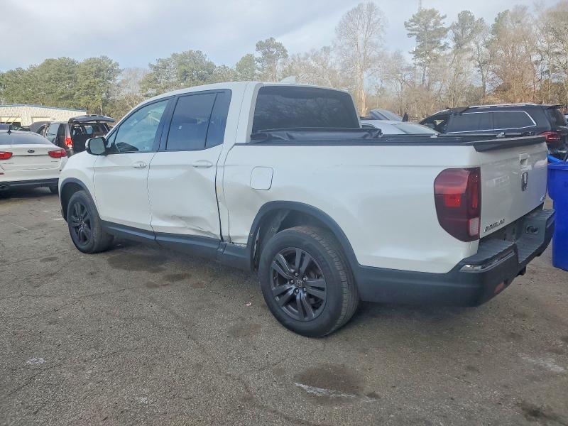 Photo 2 from auction – 2019 HONDA RIDGELINE with VIN 5FPYK3F14KB047557