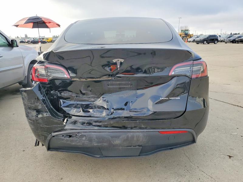 Photo 6 from auction – 2023 TESLA MODEL Y with VIN 7SAYGAEE8PF599947