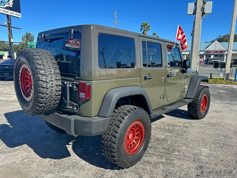 Photo 4 from auction – 2015 JEEP WRANGLER U with VIN 1C4BJWEG5FL559114