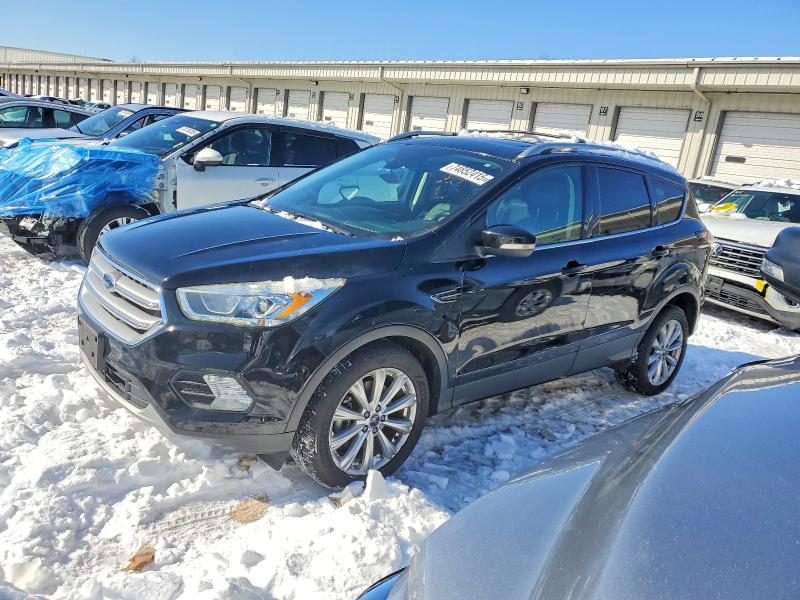 FORD ESCAPE TIT 2017 with VIN 1FMCU9JD3HUD33221 - Photo from auction