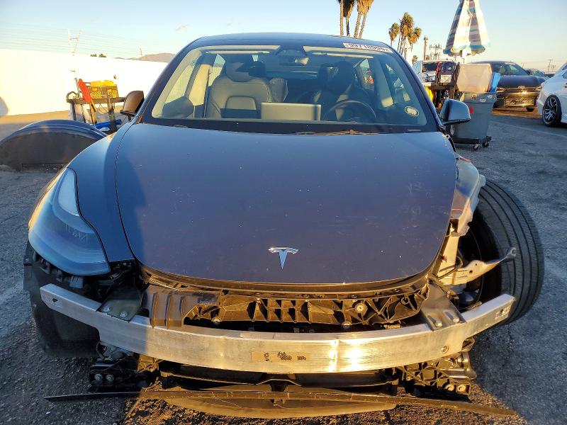 Photo 5 from auction – 2023 TESLA MODEL 3 with VIN 5YJ3E1EA3PF675021