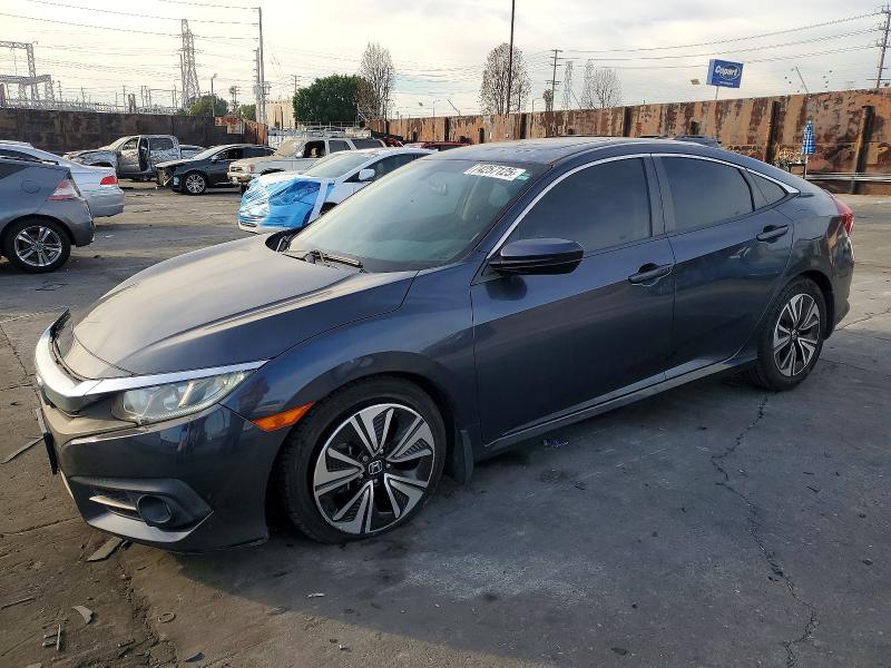 Photo 1 from auction – 2017 HONDA CIVIC with VIN 2HGFC1F34HH640553