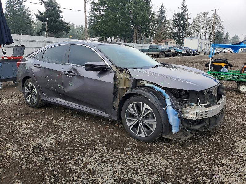 Photo 4 from auction – 2016 HONDA CIVIC with VIN 2HGFC1F30GH631072
