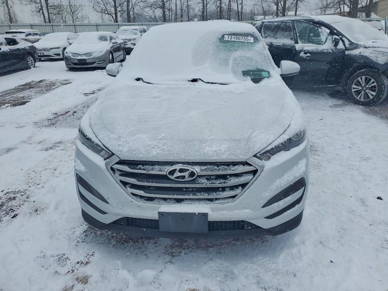 Photo 5 from auction – 2018 HYUNDAI TUCSON SE with VIN KM8J2CA40JU759349