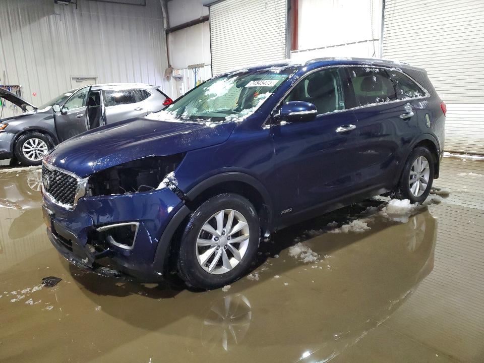 KIA SORENTO LX 2016 with VIN 5XYPGDA34GG095032 - Photo from auction