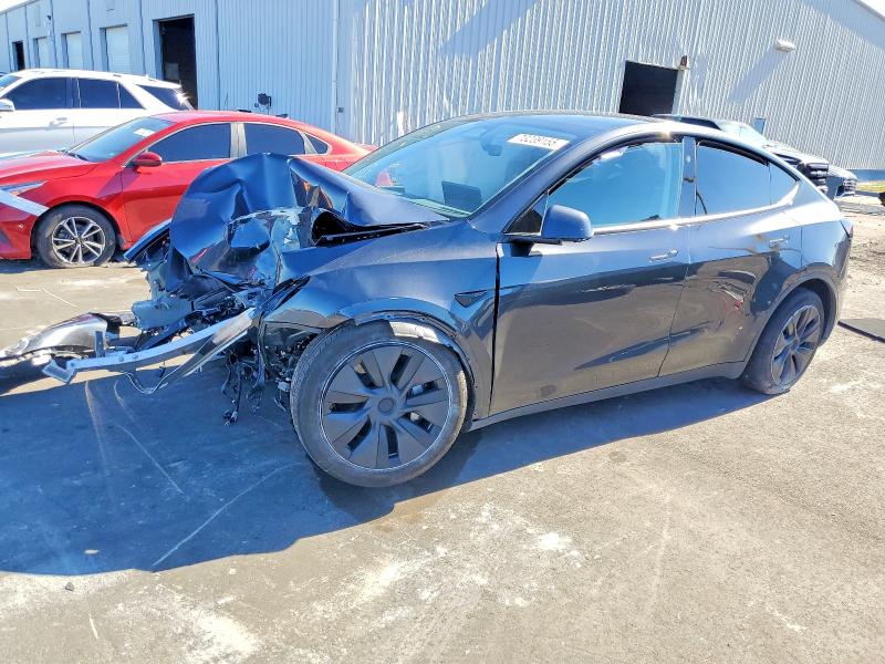TESLA MODEL Y 2024 with VIN 7SAYGDED7RF183612 - Photo from auction