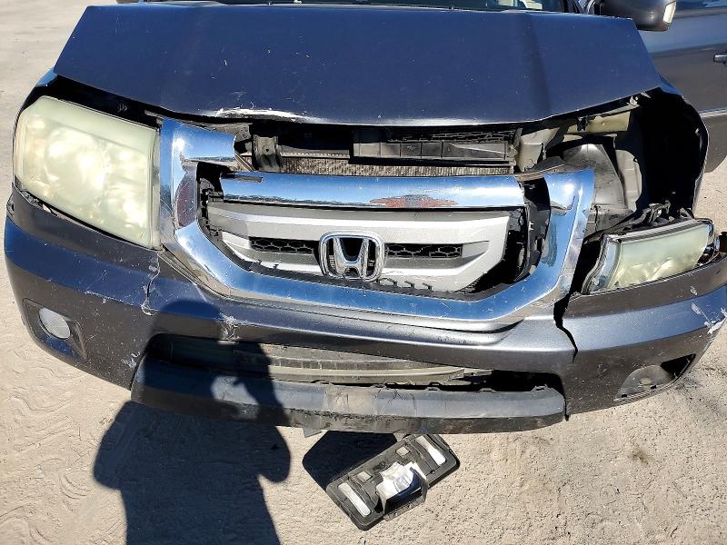 Photo 12 from auction – 2010 HONDA PILOT TOUR with VIN 5FNYF3H95AB008975