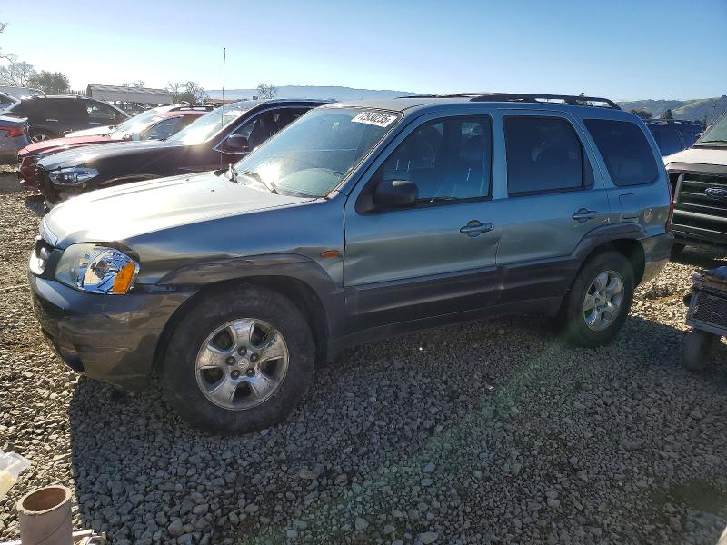 MAZDA TRIBUTE 2003 with VIN 4F2CZ96103KM06120 - Photo from auction