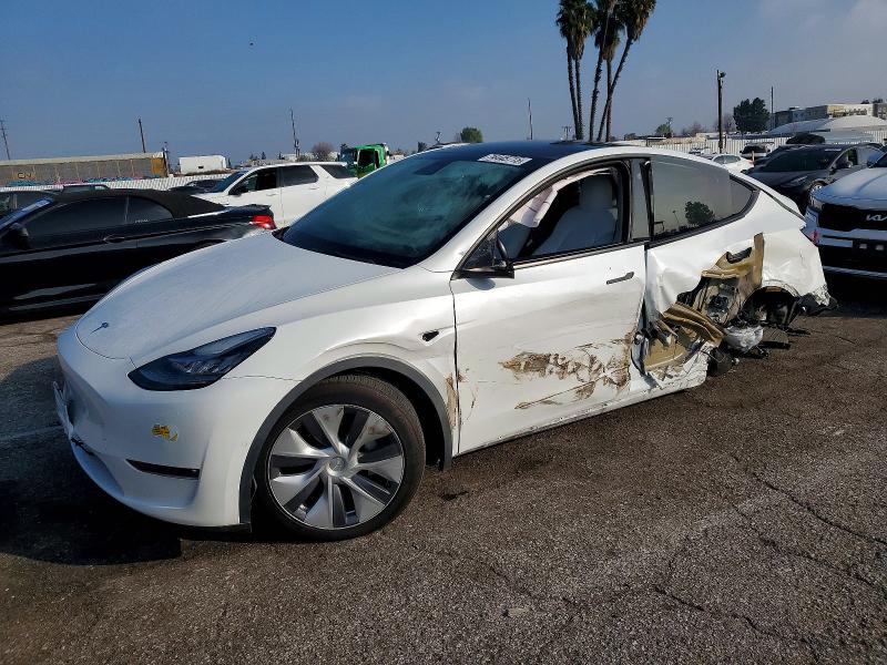 TESLA MODEL Y 2022 with VIN 7SAYGDEE4NF353783 - Photo from auction