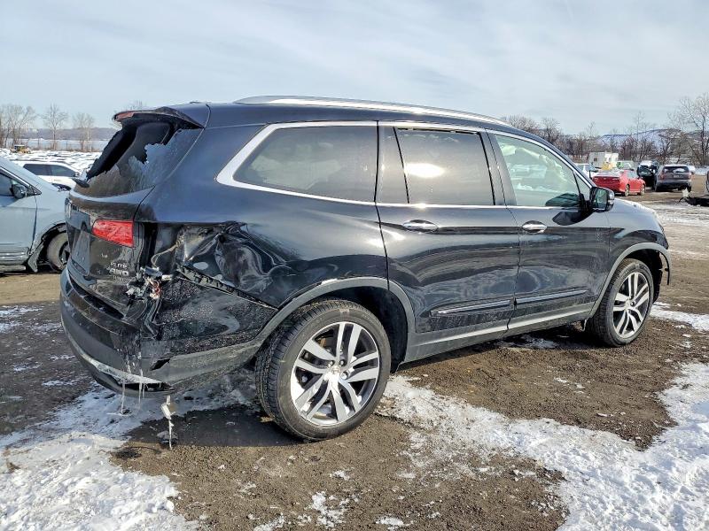 Photo 3 from auction – 2017 HONDA PILOT ELIT with VIN 5FNYF6H07HB027833