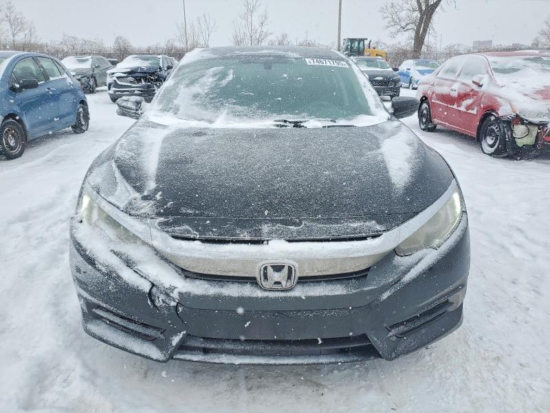 Photo 5 from auction – 2016 HONDA CIVIC EX with VIN 2HGFC2F74GH008773